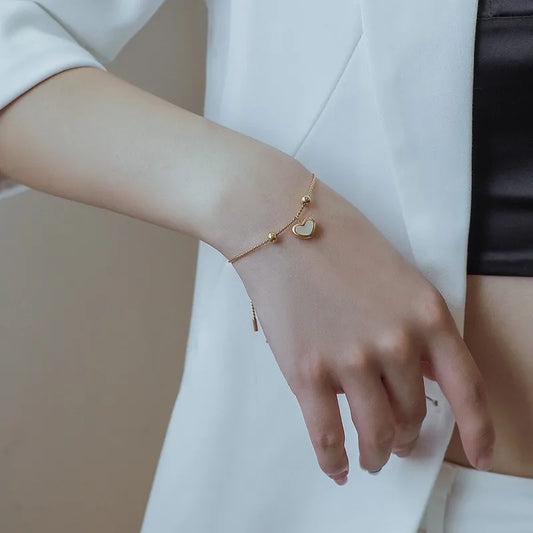 Liefdevolle goudkleurige armband