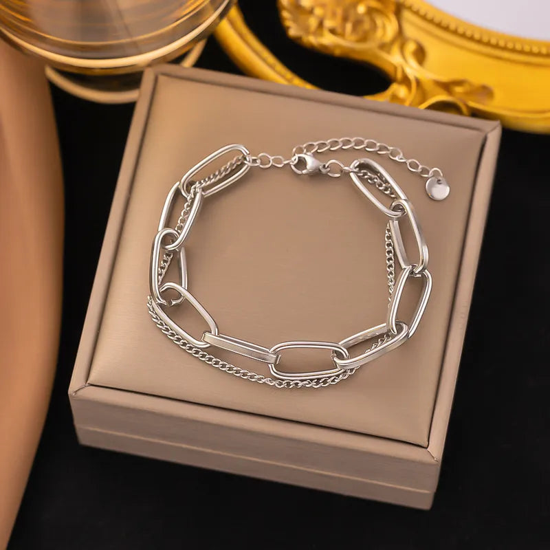 Cubaanse Schakelarmband Bewerkt met een fijn ketting Zilverkleurig