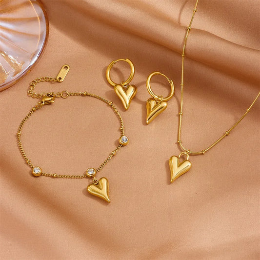 Goudkleurig sieraden set met 3D hart