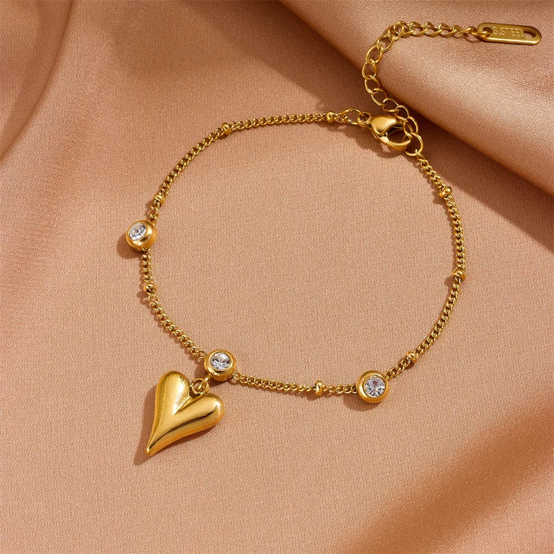 Goudkleurige Armband met zirconia en 3D hart