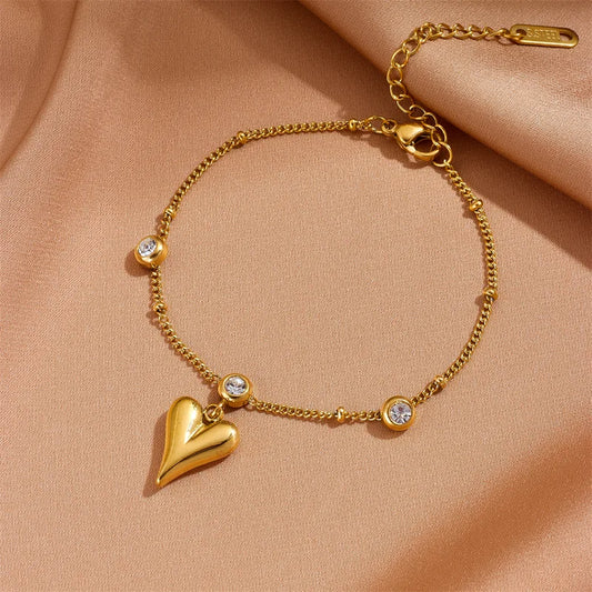 Goudkleurige Armband met zirconia en 3D hart