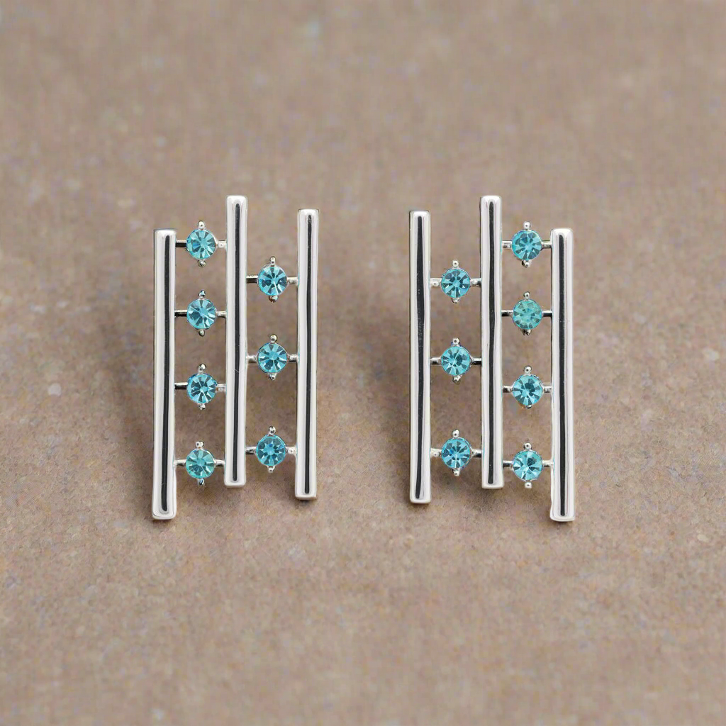zilverkleurige Oorbellen turquoise BE juwels