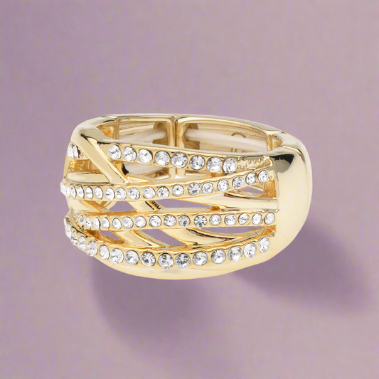 Goudkleurige elastische  fantasie ring met witte steentjes BEjewels