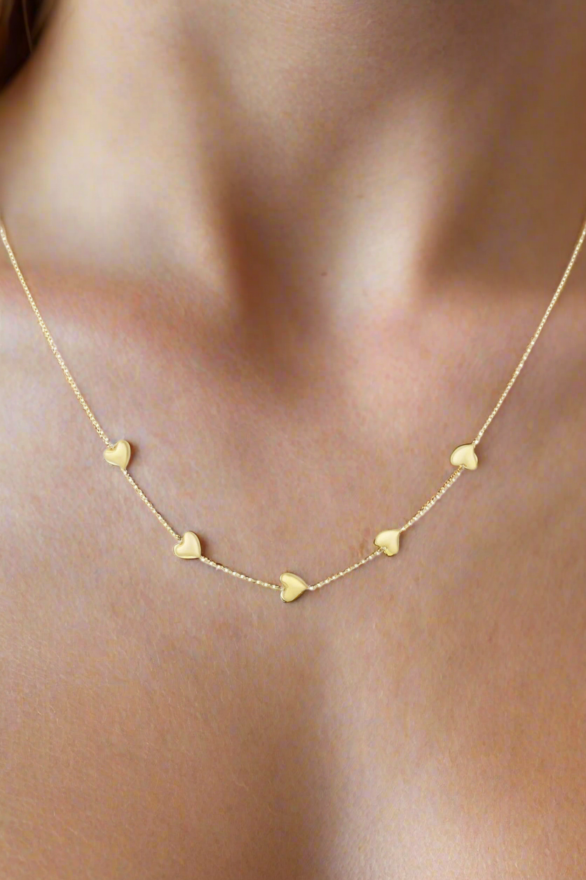 goudkleurige elegante hartenketting