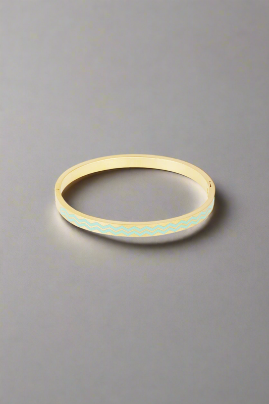 Goudkleurige armband met blauwe golvenprint