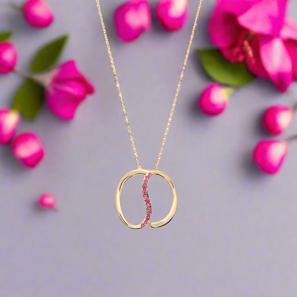 BEjewels- Ronde goudkleurige ketting met Fuchsia roze steentjes