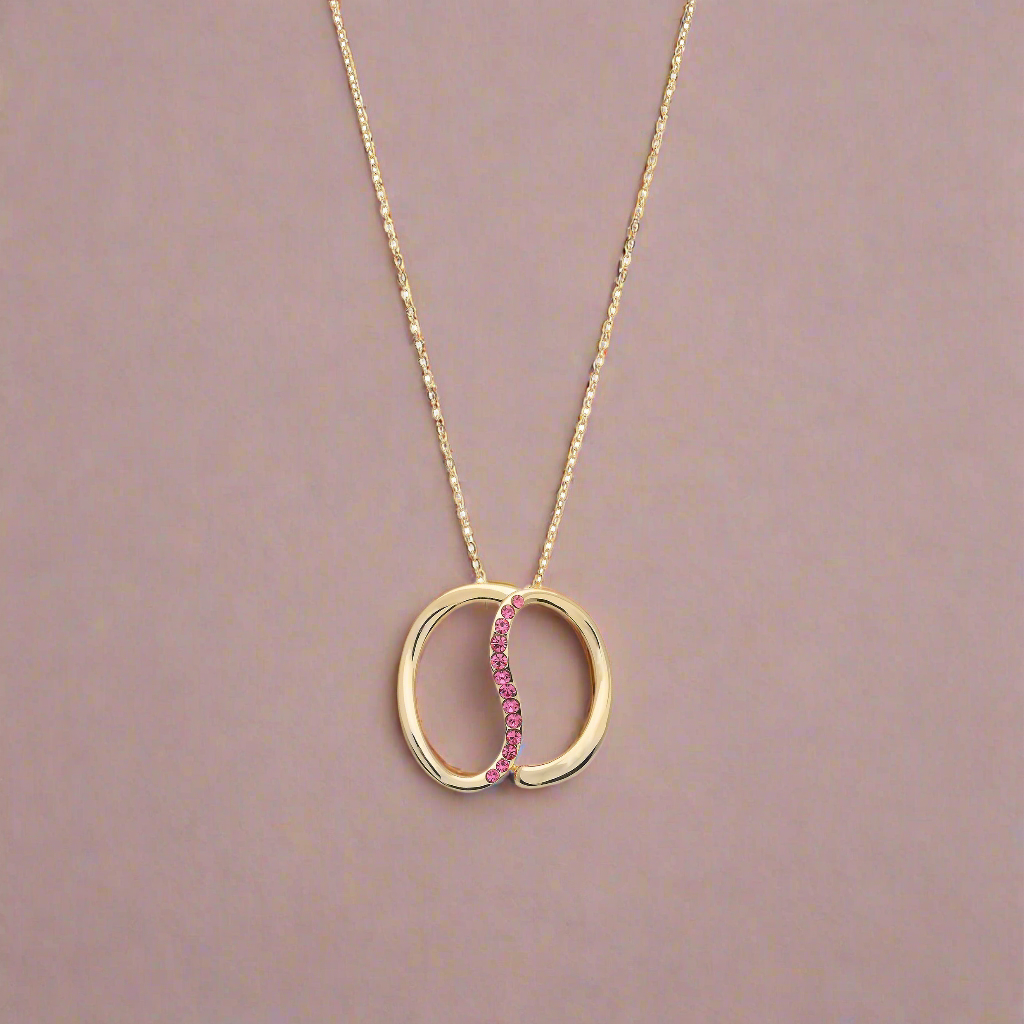 BEjewels- Ronde goudkleurige ketting met Fuchsia roze steentjes