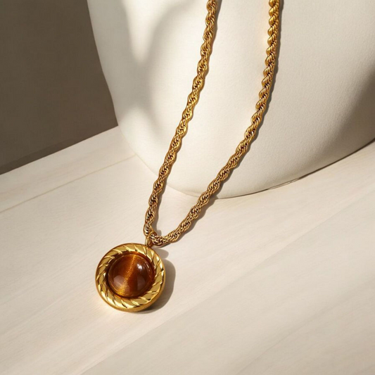 Goudkleurige ketting met bruine ronde steen sweet 7