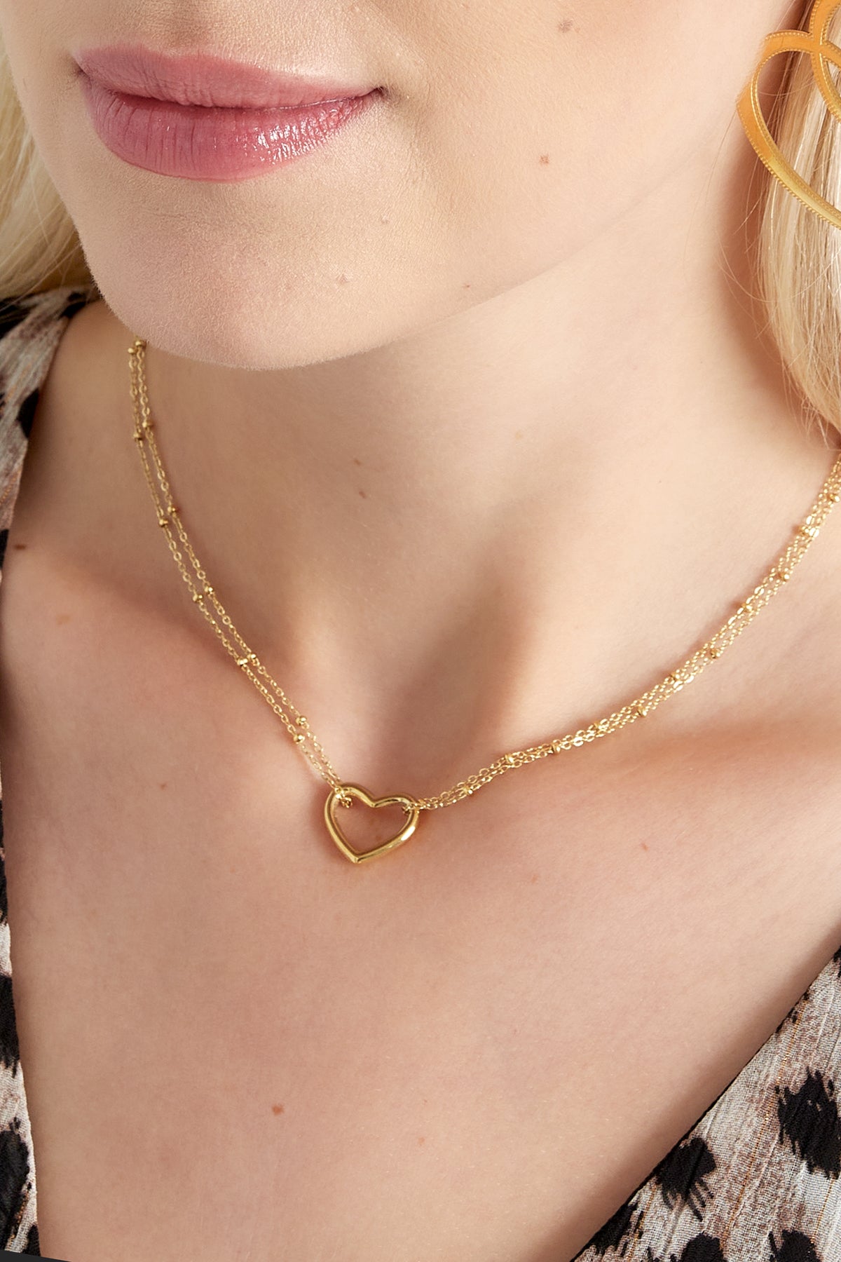 goudkleurige dubbele ketting met hart