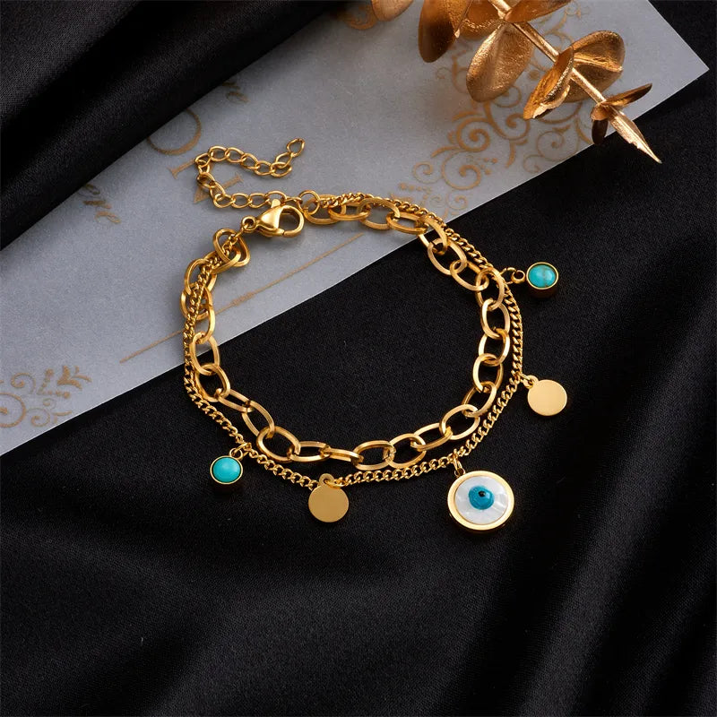 Armband vol geluk en blauwe steentjes Goud