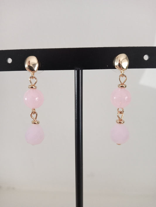 goudkleurige oorbellen met roze steentjes