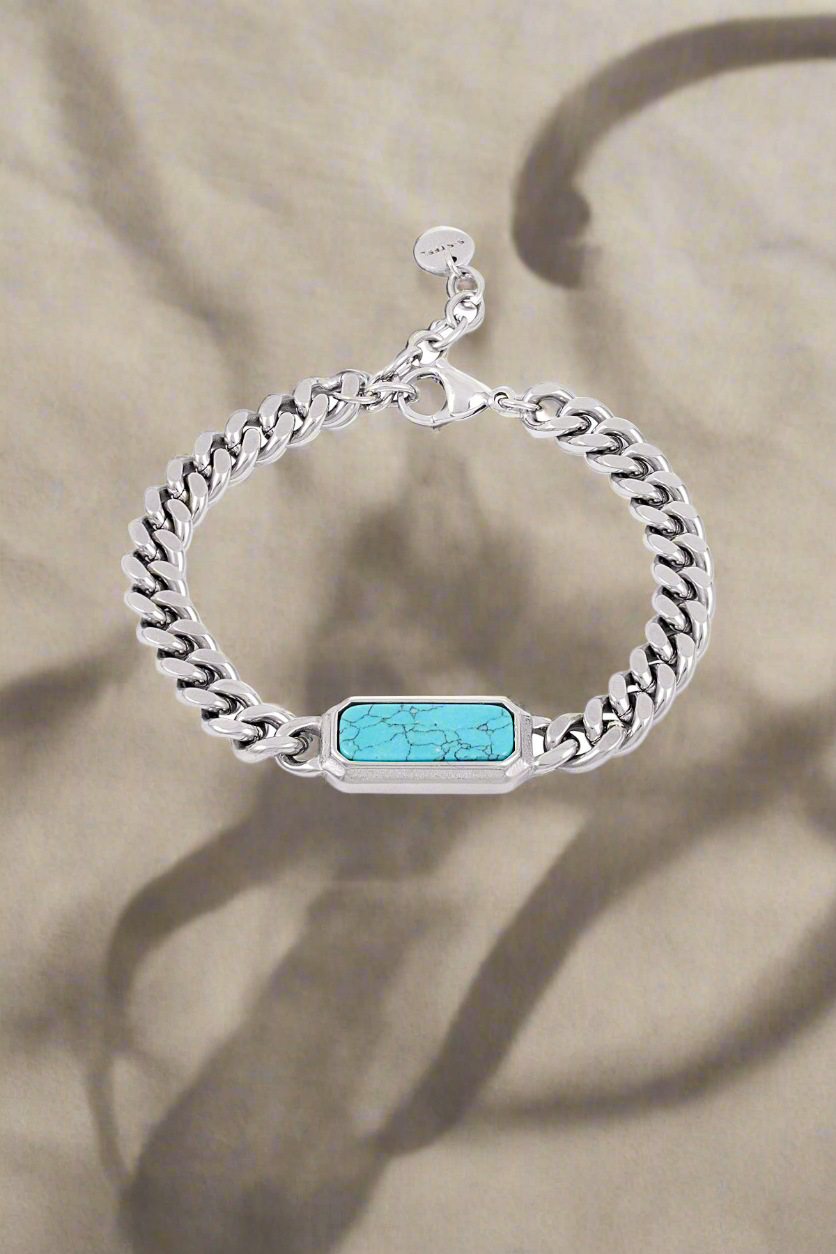 Zilverkleurige heren schakelarmband met turquoise steen