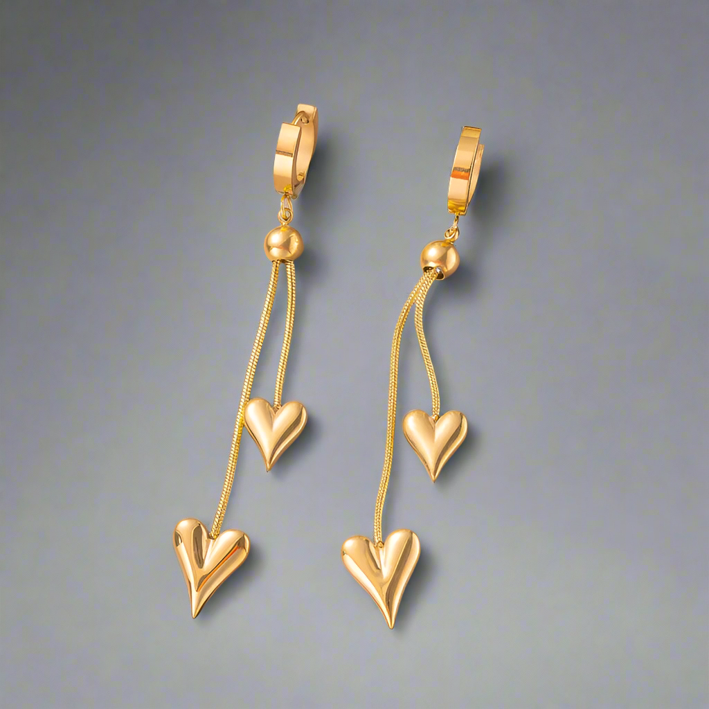 Goudkleurige lange harten oorbellen