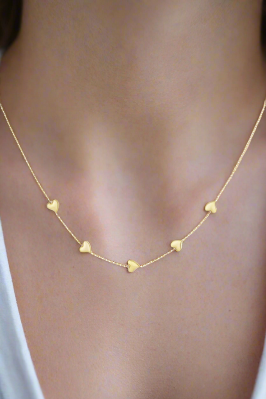 goudkleurige elegante hartenketting